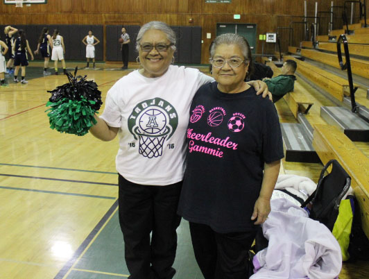 Leonie Lear Alisal class of 1969 and Julie Irinco Salinas class of 1966, pose before the girls’ basketball game. “We enjoy cheering for both boys’ and girls’ teams,” they said.