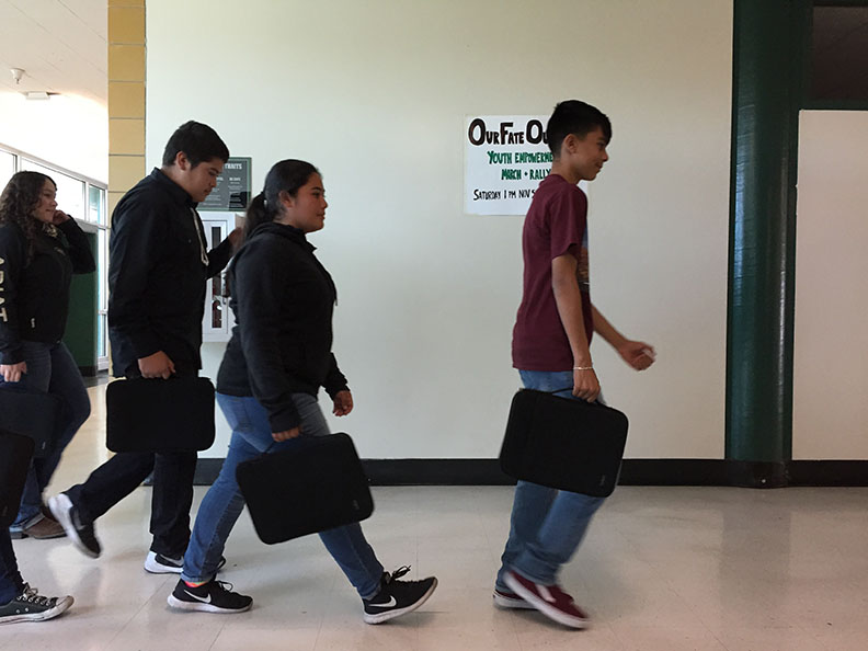 House E students carrying their Chromebooks, which have been a central part of school life at Alisal and now they are a part of every student’s daily materials.
