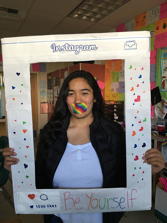 Students like senior Maria Morena showed their support for the LGBTQ community on the Day of Silence by wearing rainbow colored tape over their mouths to show the silencing effects that bullying and harassment can cause.
