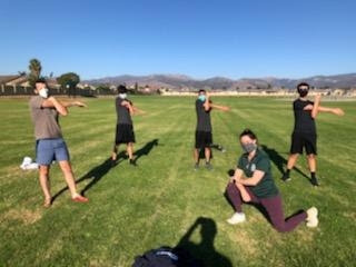  Members of the Freshmen cross country team stretch prior to a workout in October. Athletes were grouped by sport in groups of no more than 15 and weren’t allowed to intermingle. Athletic Director Jose Gil felt the coaches and athletes did a great job following the protocols, and he remains hopeful that sports will have some sort of season this year.