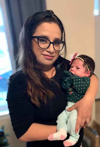 English teacher Mireya Gutierez holding her daughter. Gutierezs main goal is to keep her daughter safe, I would want people to take COVID-19 precautions more seriously. I want my daughter to grow up in a safe environment and right now it is not looking good.