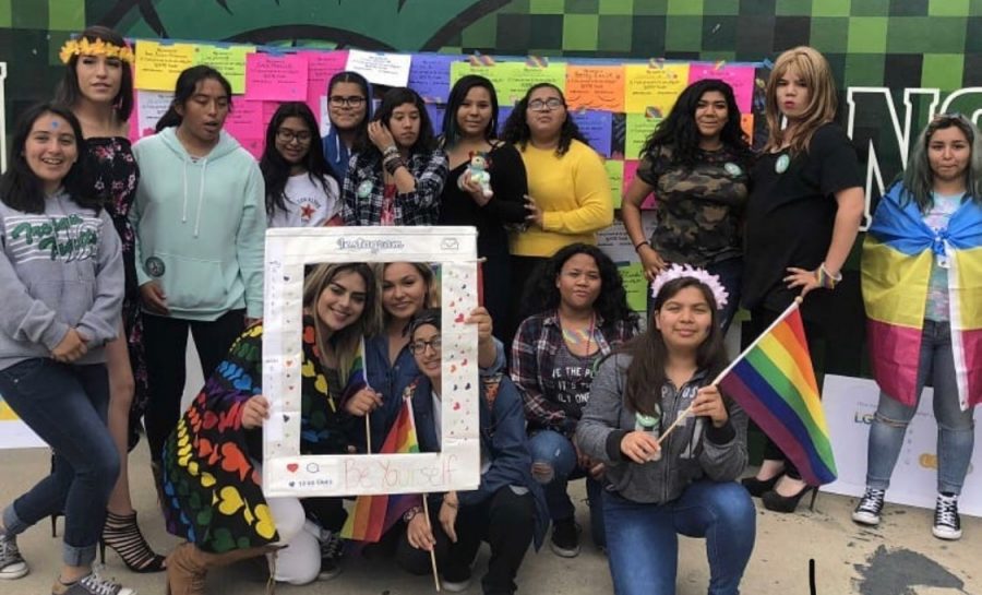  During Ally Week in October 2017, members of the Be Yourself Club pose in front of messages of support for the LGBTQ+ community. Club adviser Jaqui Gallardo said the group has continued to grow despite the pandemic. “Theyre just happy to be in a space where they can bond with each other and talk about LGBTQ+ issues,” she said.