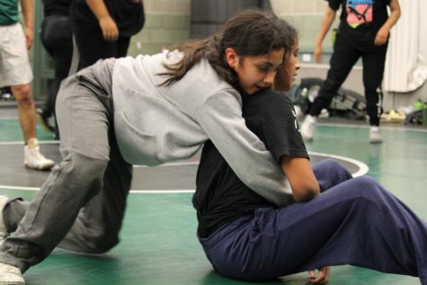 Kassandra Nieto and Alondra Juarez work on their technique at practice on December 16, 2021. Head Coach Ernesto Fuentes feels these two freshmen have what it takes to get to CCS.
