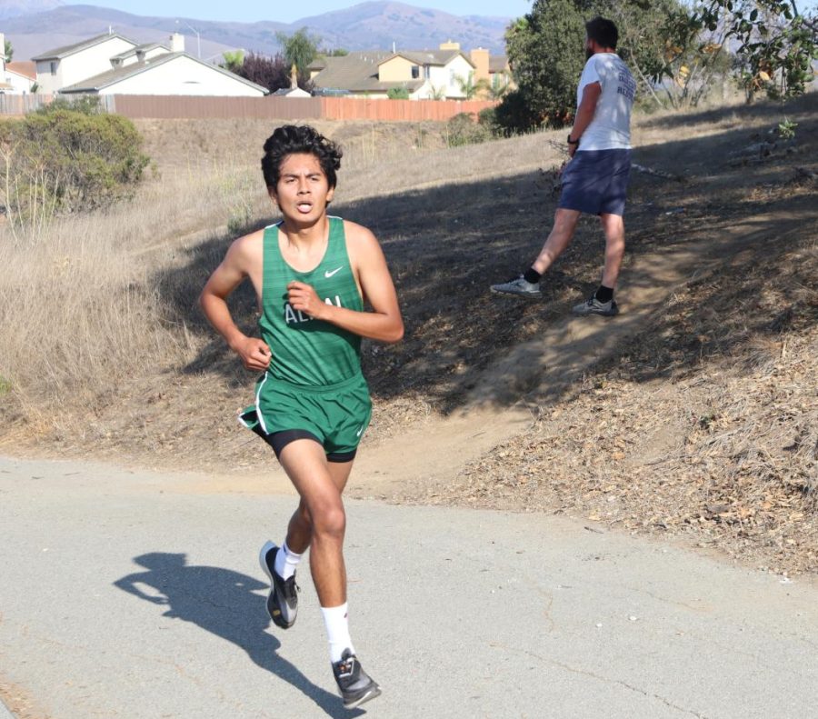 At Natividad Creek Park in Center Meet #3, senior Harry Ordiano sprints up the last hill. The varsity boys placed first; the girls placed third.  “It was an important meet, so every moment counted,”  Ordiano said.