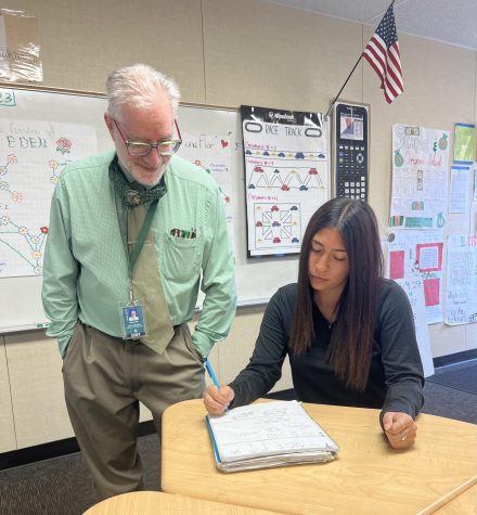 Alisal’s Teacher of the Year, Gary Golub, helps Natalie Cortes with her assignment in Transition to College Level Math. “I believe Mr. Golub is a good teacher because he’s always in an energetic mood and it’s easily noticeable that he genuinely cares and enjoys teaching as well as engaging with students,” Cortes said. 