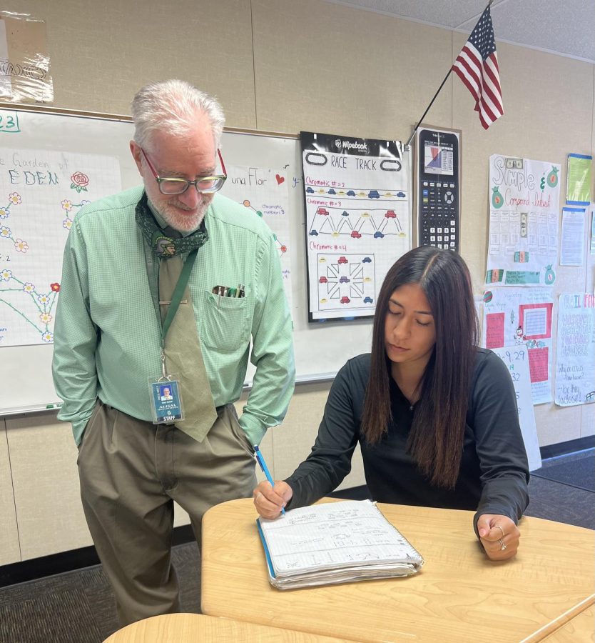 Alisal%E2%80%99s+Teacher+of+the+Year%2C+Gary+Golub%2C+helps+Natalie+Cortes+with+her+assignment+in+Transition+to+College+Level+Math.+%E2%80%9CI+believe+Mr.+Golub+is+a+good+teacher+because+he%E2%80%99s+always+in+an+energetic+mood+and+it%E2%80%99s+easily+noticeable+that+he+genuinely+cares+and+enjoys+teaching+as+well+as+engaging+with+students%2C%E2%80%9D+Cortes+said.+