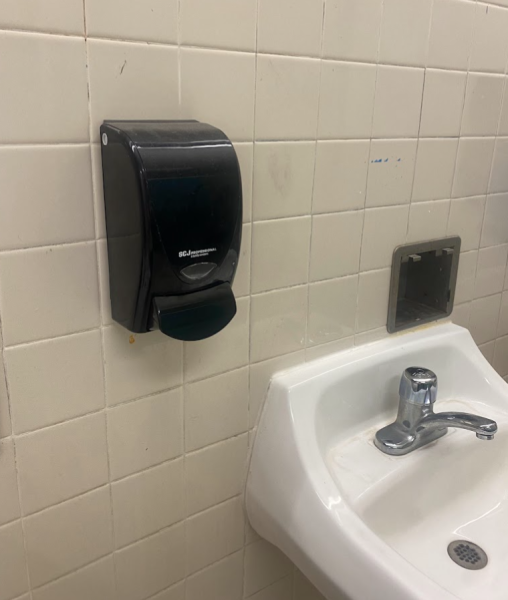 Soap Dispenser in the 700s restroom  with no soap on October 18, 2023 at 12:43 PM.