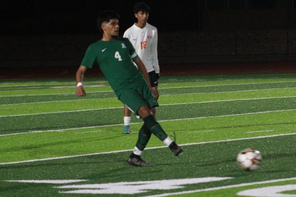 In a home game against Gonzales on November 28, senior Ronaldo Corona passes the ball to a teammate, looking to initiate the offense. The match ended 3-0, with Alisal taking the win.

