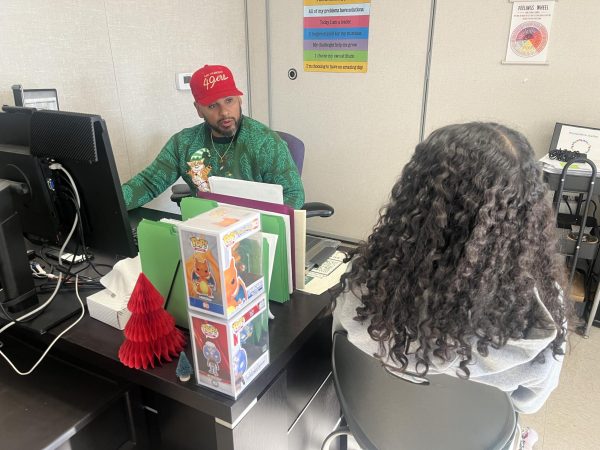 As a support that the program offers, Julio Martinez and freshman Isabella Castillo meet up to do check-ups on Castillo’s grades. “This is minimal support that we’re working with her, its to keep on checking but she’s overall doing very well,” Martinez said. 