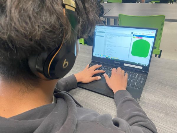 In Mr. Guzman’s 4th period Game Design Class, senior Emmanuel Laureano works on his Javascript coding for a simple graphic using the CodeHS library. “I took Game Design because I wanted more experience in coding, so I took the Intro to Computer Science first,” Laureano said. “Some students don’t know what they want to do yet, and taking a technology course may introduce them to something new which in the future might be what they want.” 
