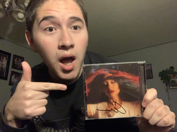 Me and my autographed copy of Ariana Grandes new album.