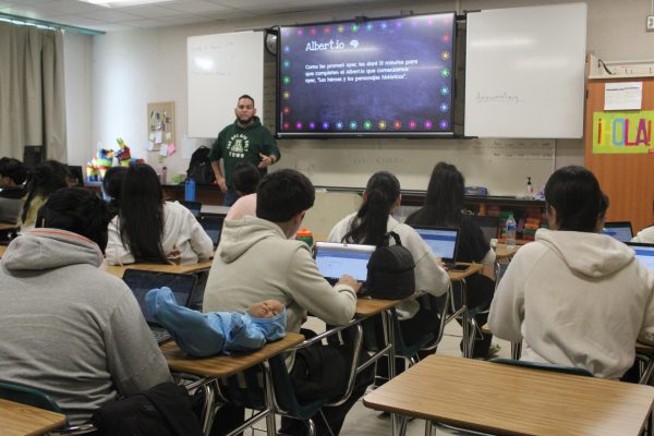 In his 6th-period  AP Spanish Language and Culture class, Mr. Torres Lopez gives instructions on the assignment. The students are engaged in completing the assignment and helping each other complete the assignment. “I think I can connect with him because he’ll be willing to join in on a conversation,” junior Leslie Gonzalez said. 
