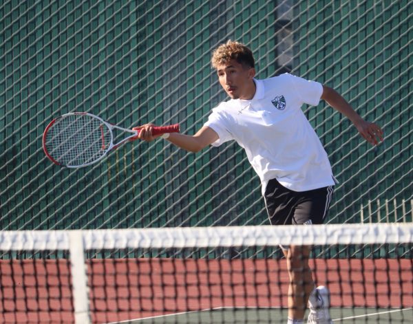 Senior Francisco Estrada hits a forehand in his doubles match against Gonzales on March 19th, 2024.
