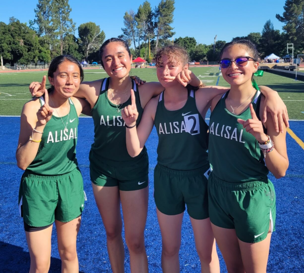 The members of the 4x400 relay team - Luz Mejia-Martinez, Massiel Hernandez, Alexa Martinez, and Erika Castro- set a school record at the PCAL Division Championship.