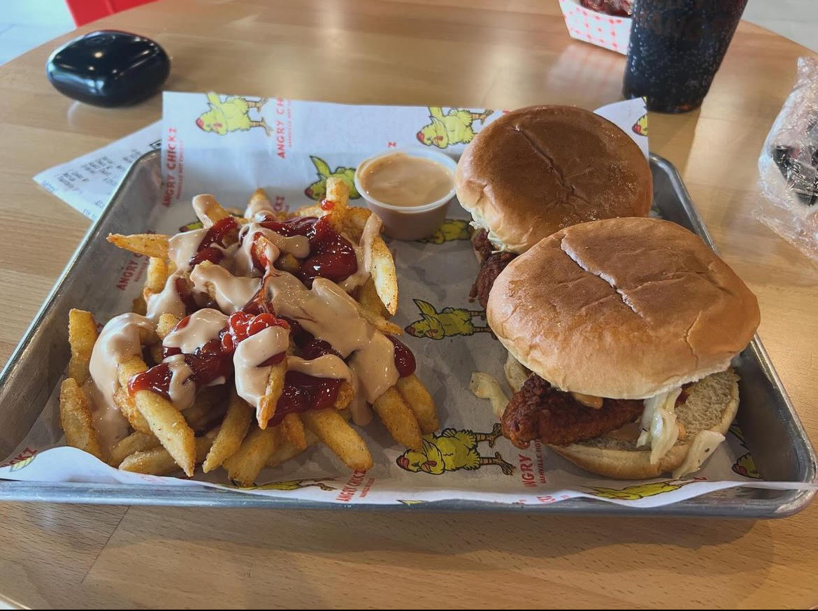 The cashier recommended the classic fries and two hot chicken sliders with slaw, and  I went with it. Winner, winner chicken dinner!