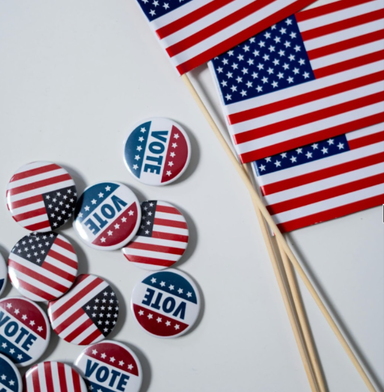 (https://www.pexels.com/photo/american-flags-and-pins-on-white-background-4669109/