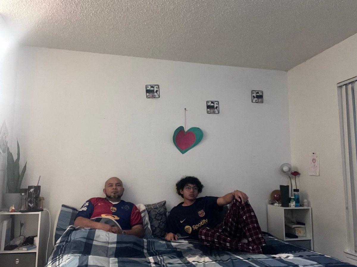 SCORE?! My father, Mardo Portillo, and me watching a game replay of football in his room. Barcelona’s forward, Ferran Torres, scored a goal that was barely onside assisted by 17-year-old, Lamine Yamal, putting them ahead on the scoreboard 2-1 in the 82nd minute.
