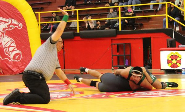 At the Palma dual meet, junior Fabian Martinez pinned his opponent, not only giving him a win but also setting up the team for their first league win of the season. “I worked hard for this win and I feel happy with the results,” Martinez  said. 
