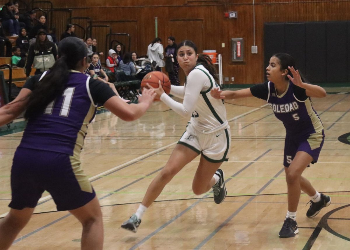 In the league opener against Soledad, junior Nayeli Gil-Silva goes up for a layup during the third quarter. The Trojans won a thriller,  49-48. “We beat the team who won CCS championship last year,” Gil-Silva said. “So, like that definitely made us feel like, oh my gosh, we can do this.” Unfortunately, Gil-Silva would suffer a knee injury in a loss to Salinas, which will sideline her for the next 4-6 weeks.

