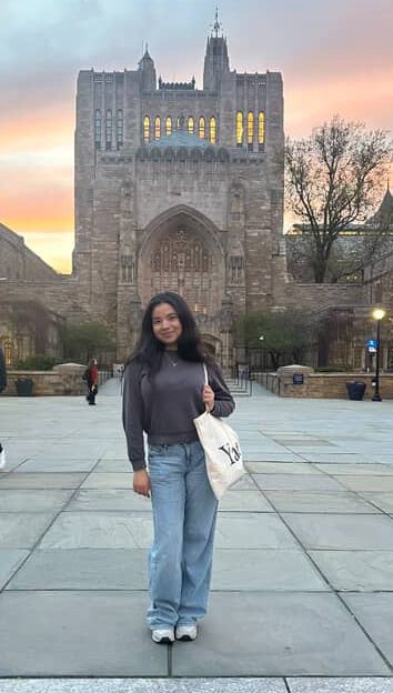 In front of the Sterling Memorial on the second day of Bulldog Days, Lizeth Ortiz gets her picture taken by her new Yale friend Sekai Minah. Ortiz will be attending Yale on a full ride. “This was one of the very few moments I actually got to snap a picture of myself because the days were so hectic but so fun. The people I got to meet were incredible.”