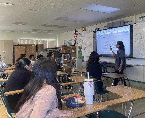 Junior English teacher Venetia Rivera  talking to her 4th-period class before starting the audiobook for Fahrenheit 451. One of her third-period students, Valeria Gonzalez, says that Rivera has helped make their connection stronger and she will miss her very much. “It hurts because there are people that are also in the Health Academy who won't get to experience a supportive person like that, encouraging them and pushing them to do their best in literature,” Gonzalez said. 
