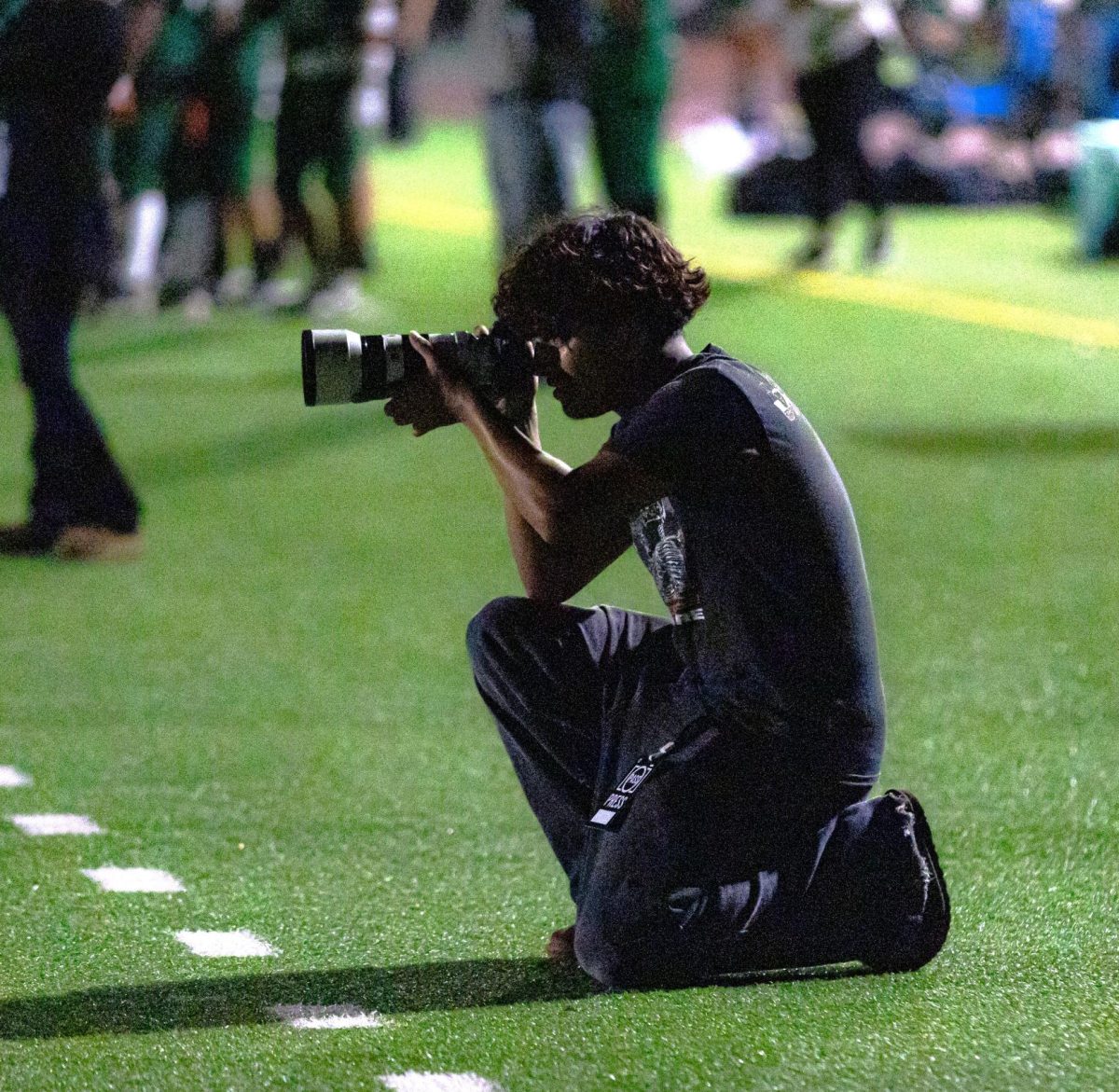 Taking pictures at the freshman football game against Monterey with my  new Sony A7R iii. This game was very exciting and the atmosphere was electric because it was the team's first win.
