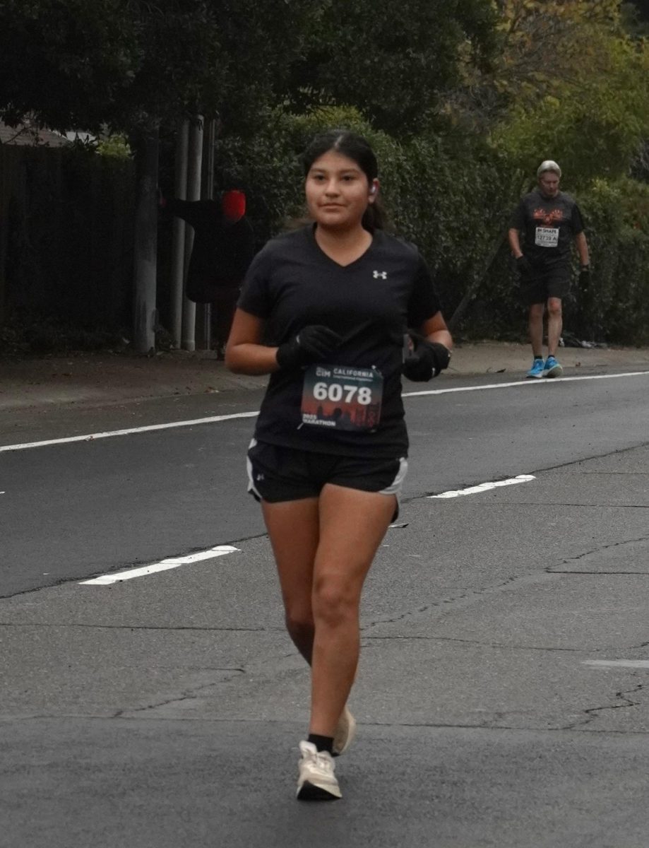 Around mile 10 of the California International Marathon, Perez was nearly halfway done and steadily getting closer to the finish line. “I felt relieved that I was going to stop soon and I wanted to walk really bad,” she said. (Picture courtesy of sac26.com)
