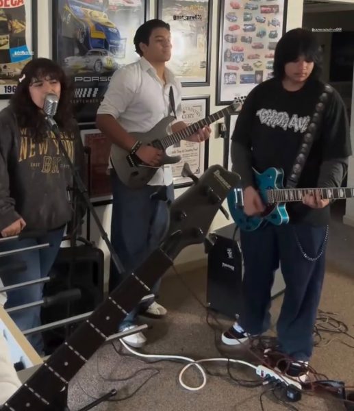At a group practice, sophomore Layla Gutierrez sings, while seniors Armando Gutierrez and Jaden Cerna play the electric bass and guitar. “It’s cool being in a band with [my sister], but though we’re related, sometimes our ideas in the creative process differ and cause some conflicts,” Armando said. (@hopelesssamaritanband)