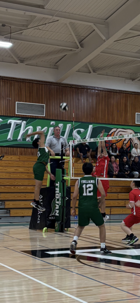 In an attempt to break the tie, outside hitter Angel Mejia delivers a powerful spike against Hollister. Despite the team's efforts, the boys lost 0-3. “We were filled with overconfidence,” he said. “We beat them at the start of the league season and we forgot we still needed to give the game our fullest until it was too late.”