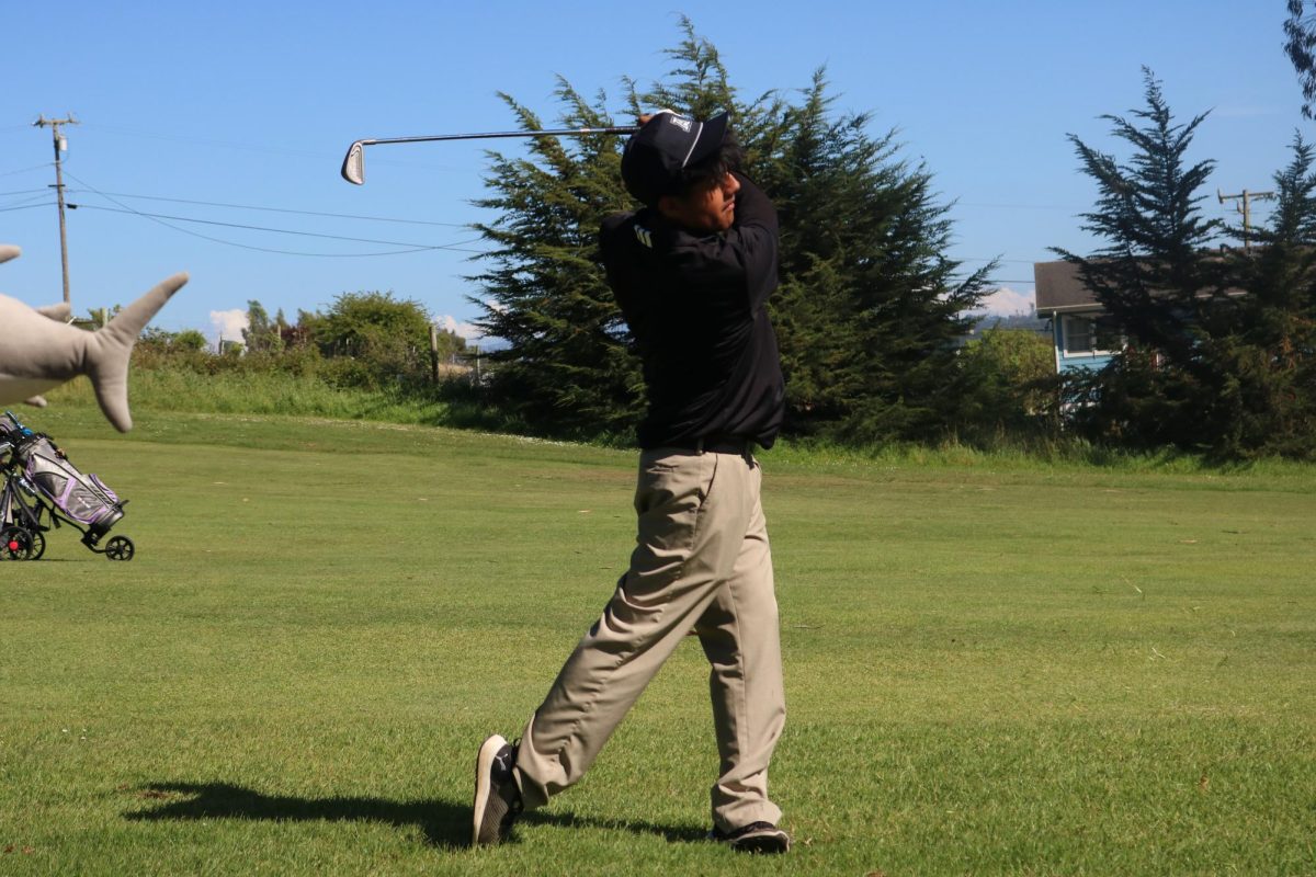 Against MB Academy on April 8, junior Jhonn Silva narrowly escapes the sand bunker. “I felt pretty good about the match because I got to play the course again and improved from the last 2 times,” he said. “I went into the bunker, but it had enough speed that it rolled out.”