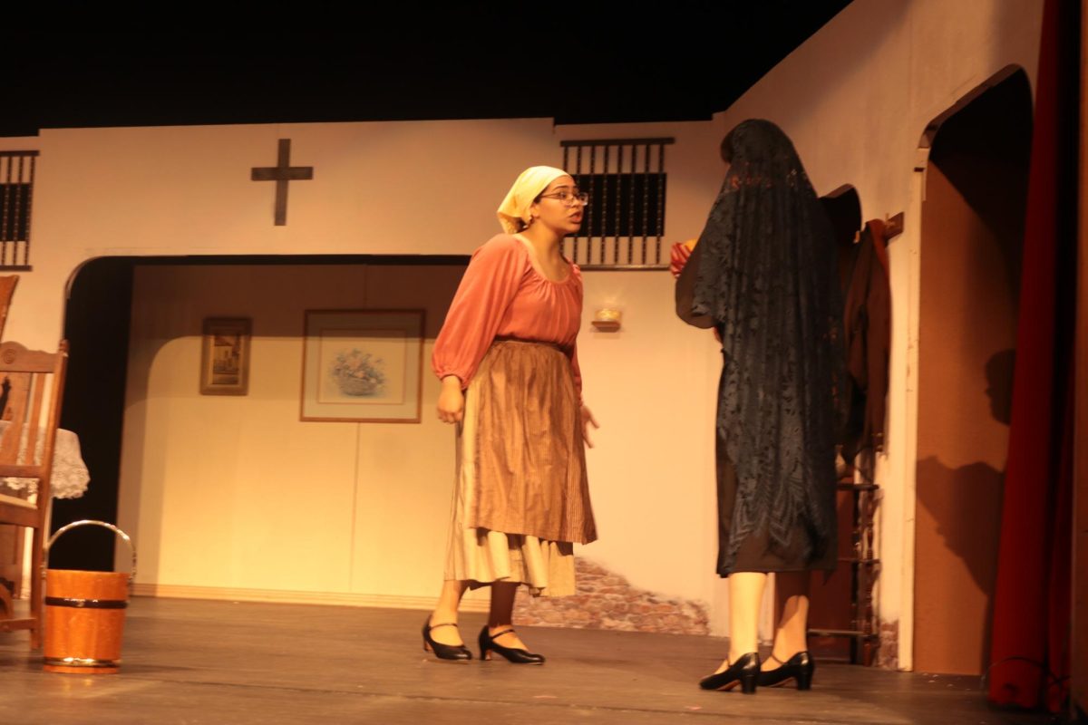 Me, as La Criada, confronts the beggar woman as she desperately tries to take the leftovers for her child, but pushes her away, believing she needs the food more herself. While performing this scene, I tried to portray La Criada’s desperation and frustration, but also the hidden guilt in her actions. Looking back at the production as a whole, I feel proud and relieved that we pulled off awesome performances. I’m proud of the growth I accomplished with this role. 